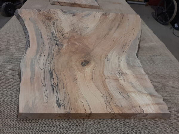 Close up of spalted Maple slab with live edge