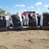 Large bags of firewood on pallets